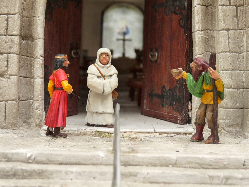 A la porte de l'église